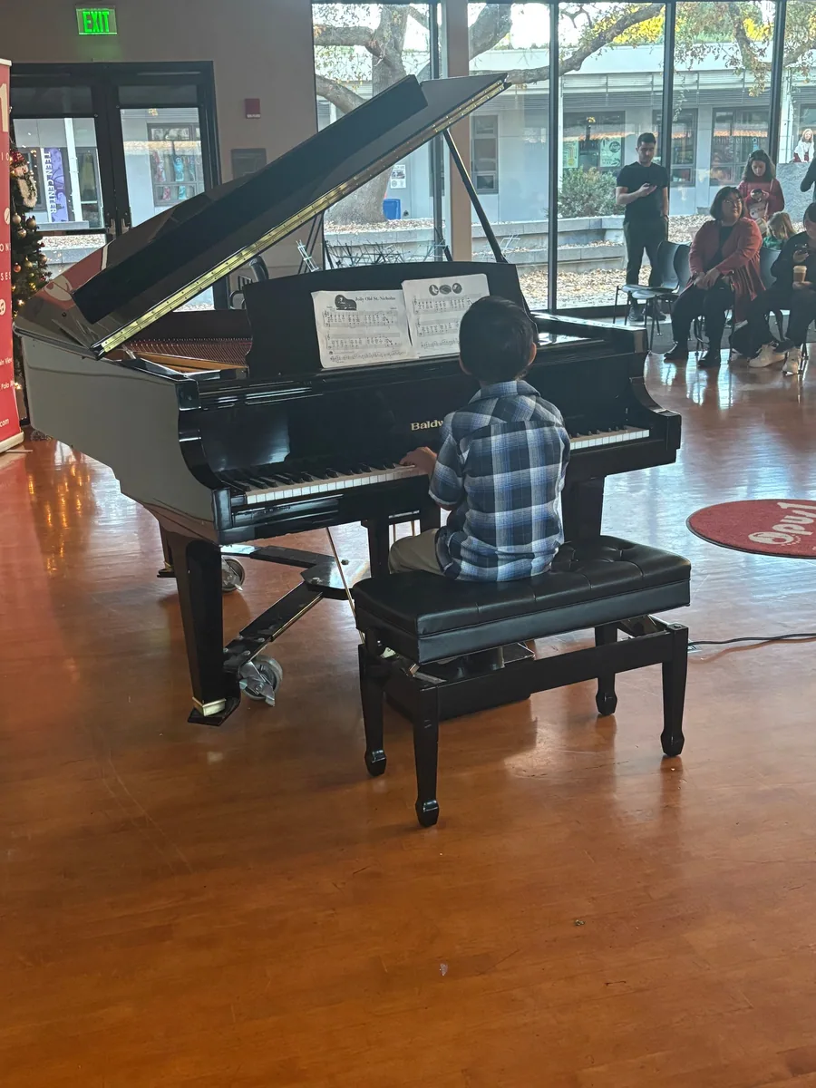 Holiday party student performance at Opus 1