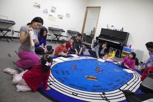 Young MYC students in class