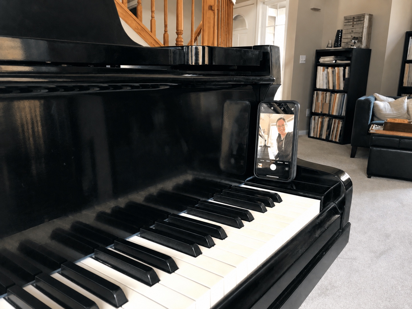Laptop setup showing a piano student during an online lesson